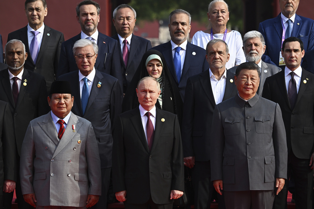 Front from left, Indonesian President Prabowo Subianto, Russian President Vladimir Putin and Chinese President Xi Jinping pose for a group photo ahead of a military parade to commemorate the 80th anniversary of Japan's World War II surrender held in front of Tiananmen Gate in Beijing, China, Wednesday, Sept. 3, 2025. (Sergei Bobylev, Sputnik, Kremlin Pool Photo via AP)