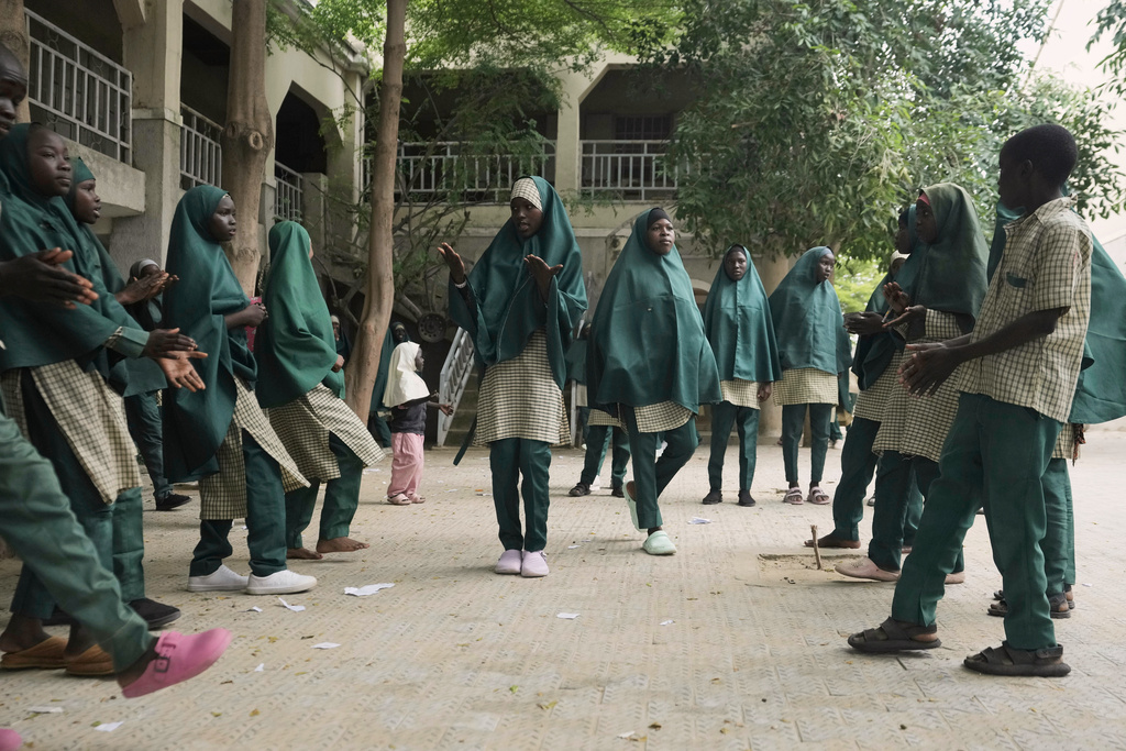 Students of the Future Prowess Islamic Foundation School perform a traditional dance, in Maiduguri, Nigeria, Thursday, July 24, 2025. (AP Photo/Sunday Alamba)