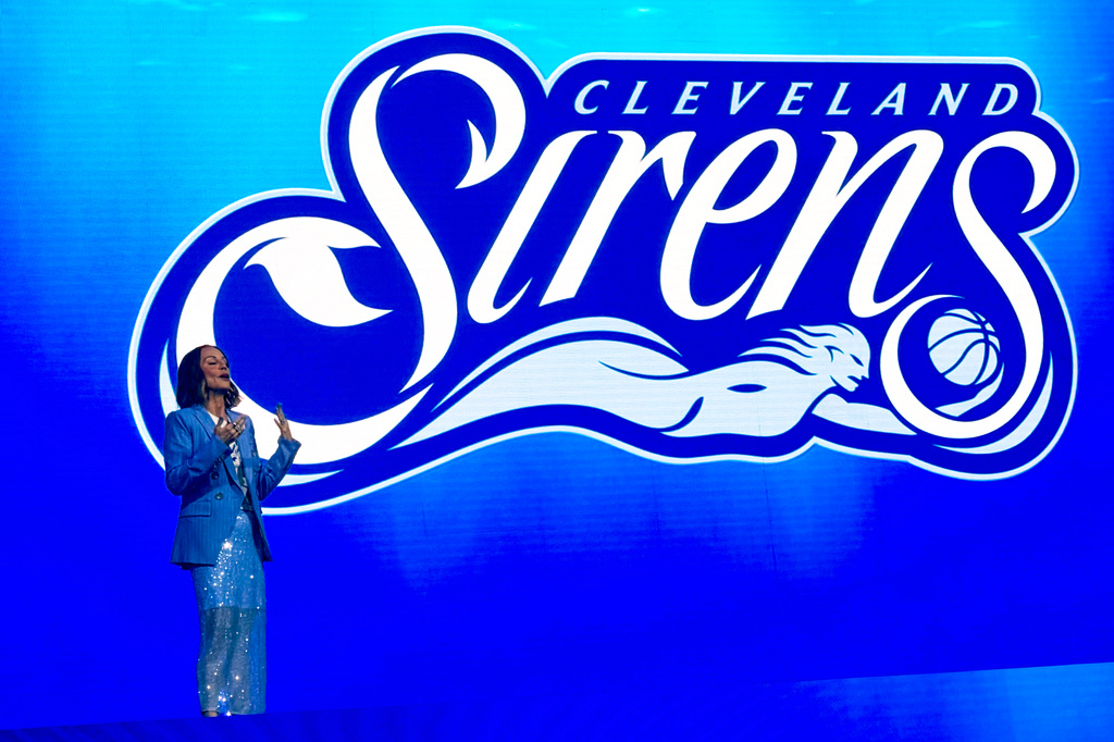 Cleveland Sirens President of Business Operations Allison Howard introduces the name of Cleveland’s WNBA franchise during an event at Rocket Arena, Tuesday, Aug. 4, 2026, in Cleveland. (AP Photo/Joe Reedy)