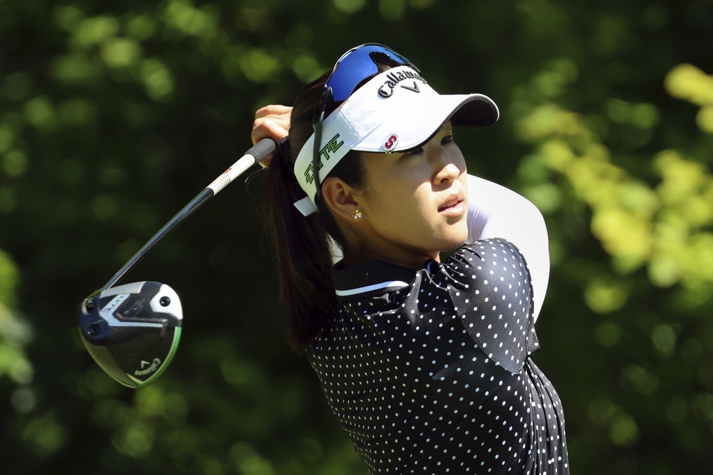 Andrea Lee, of the United States, tees off on the first hole during the final round of the FM Championship LPGA golf tournament at TPC Boston, Sunday, Aug. 31, 2025, in Norton, Mass. (AP Photo/Michael Dwyer)