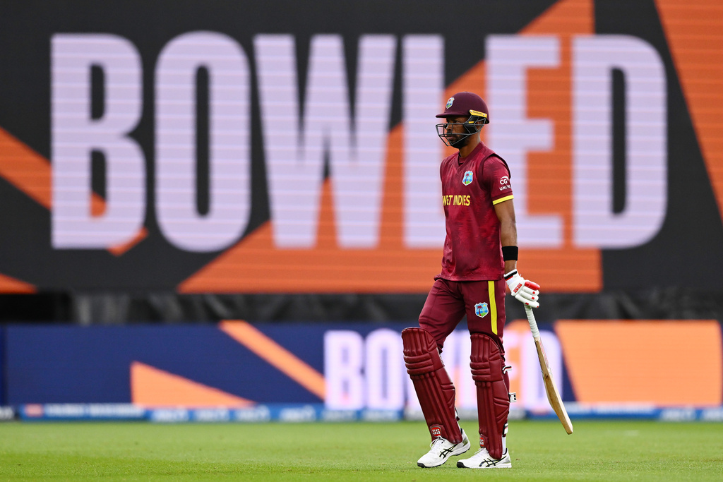 West Indies' Roston Chase walks off after he is bowled by New Zealand's Nathan Smith during their One Day International cricket match in Napier, New Zealand, Wednesday Nov. 19, 2025. (Kerry Marshall/Photosport via AP)