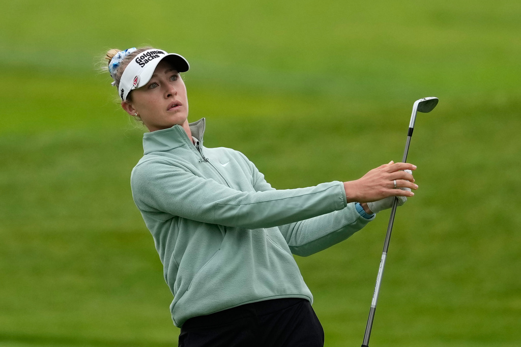 Nelly Korda reacts after a shot on the first hole during the first round of the Women's PGA Championship golf tournament, Thursday, June 25, 2026, in Chaska, Minn. (AP Photo/Chris Carlson)