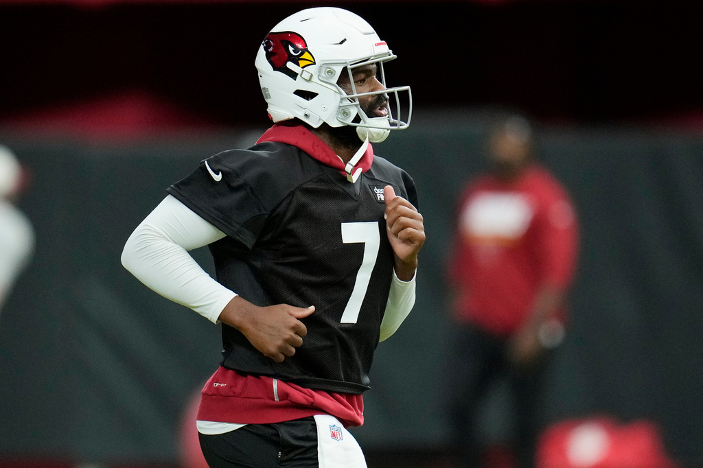 Arizona Cardinals quarterback Jacoby Brissett runs to another passing drill station during NFL football training camp practice, Thursday, July 23, 2026, in Glendale, Ariz. (AP Photo/Ross D. Franklin)