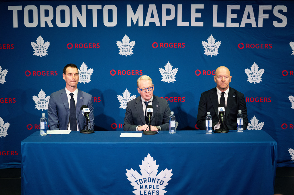 New Toronto Maple Leafs General Manager John Chayka, left to right, MLSE President and CEO Keith Pelley, and new Toronto Maple Leafs Senior Executive Advisor, Hockey Operations, Mats Sundin, hold a press conference in Toronto on Monday, May 4, 2026. (Arlyn McAdorey/The Canadian Press via AP)