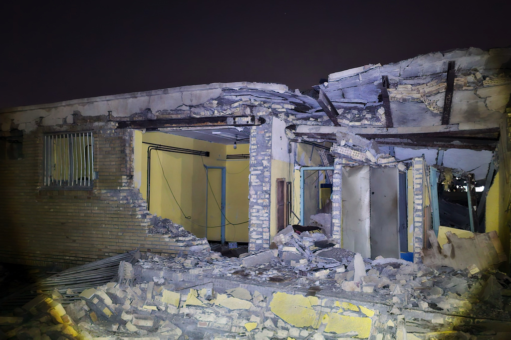 Damage is seen at a building that Iranian media said was hit in a U.S. strike in Kuhestak, southern Iran, early Wednesday, Sept. 2, 2026. (Masoud Mohammadi/Tasnim News Agency via AP)