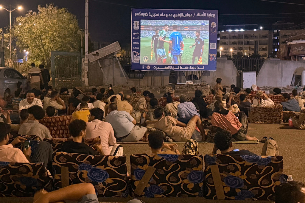 Fans gather to watch the first match of the World Cup between Mexico and South Africa at a coffee shop in Aden, Yemen, Thursday, June 11, 2026. (AP Photo/Abdulnasser Alseddik)