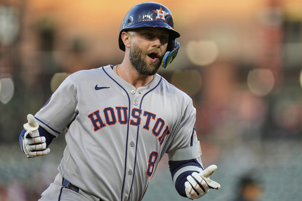 Houston Astros' Christian Walker reacts toward the dugout after hitting a two-run home run during the first inning of a baseball game against the Baltimore Orioles, Thursday, Aug. 21, 2025, in Baltimore. (AP Photo/Stephanie Scarbrough)