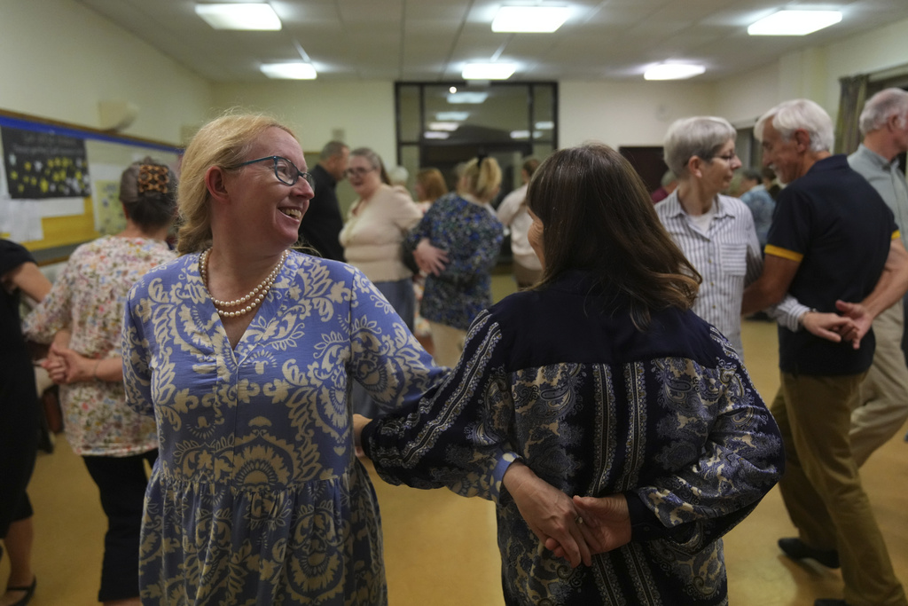 Members of the Hampshire Regency Dancers practice dance in Winchester, England, Sept. 10, 2025, ahead of the 10 days Jane Austen Festival starting on Friday. (AP Photo/Joanna Chan)