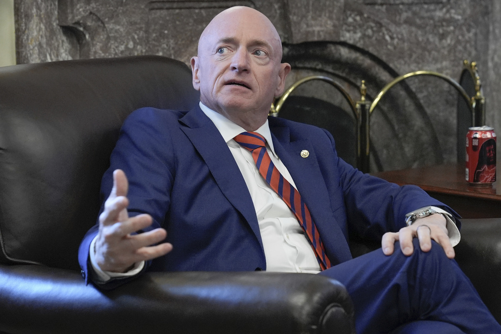 Sen. Mark Kelly, D-Ariz., speaks to reporters on AI during a news conference at the Capitol Hill, Wednesday, Sept. 17, 2025, in Washington. (AP Photo/Mariam Zuhaib)
