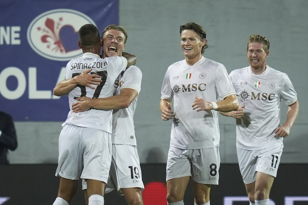 Napoli's Rasmus Hojlund celebrates after scoring during the Serie A soccer match between Fiorentina and Napoli at the Artemio Franchi Stadium in Florence, Italy, Saturday, Sept. 13, 2025. (Massimo Paolone/LaPresse via AP)