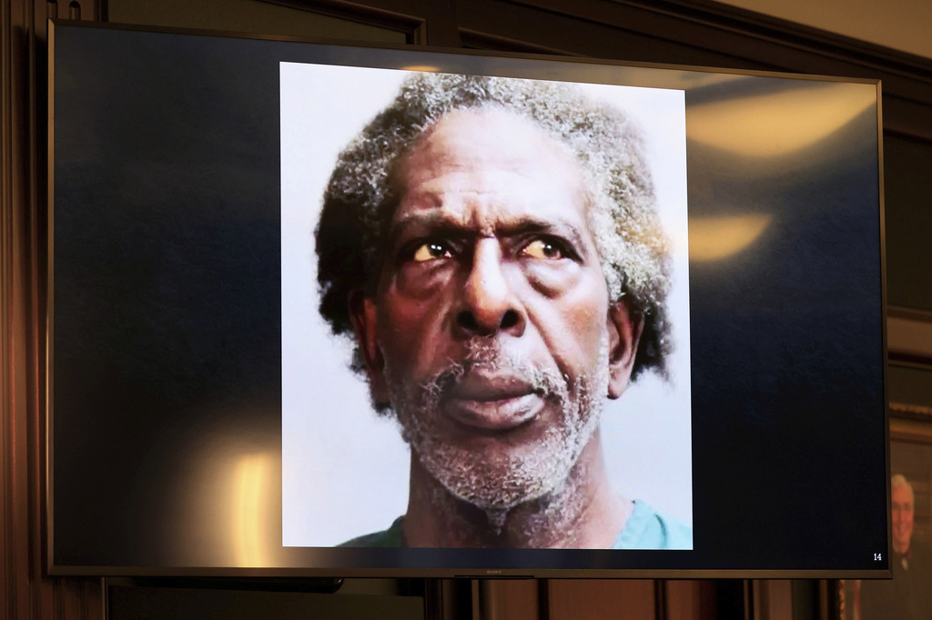 A photo of accused shooter Henry Tenon is shown during opening statements in the trial of Mario Fernandez Saldana at the Duval County Courthouse on Monday, Aug. 17, 2026, in Jacksonville, Fla. (Corey Perrine/The Florida Times-Union via AP, Pool)