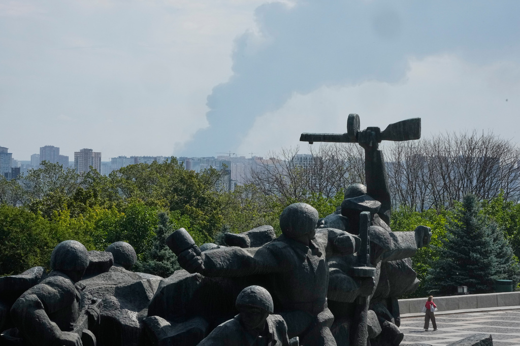Smoke rises over the city center after a Russian attack on Kyiv, Ukraine, Thursday, Aug. 27, 2026. (AP Photo/Efrem Lukatsky)