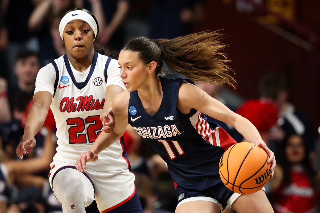 Gonzaga guard Allie Turner, right, works around Mississippi guard Denim Deshields (22) during the first half in the first round of the NCAA college basketball tournament, Friday, March 20, 2026, in Minneapolis. (AP Photo/Matt Krohn)