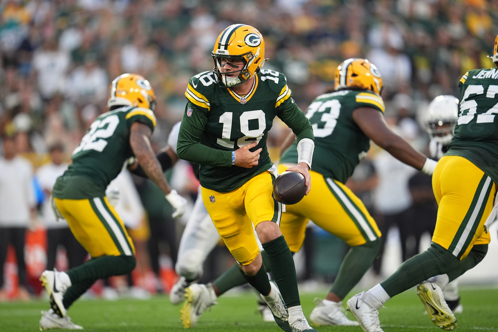 Green Bay Packers' Kyle McCord looks to hand the ball off during the first half of a preseason NFL football game against the Arizona Cardinals Friday, Aug. 28, 2026, in Green Bay, Wis. (AP Photo/Abbie Parr)