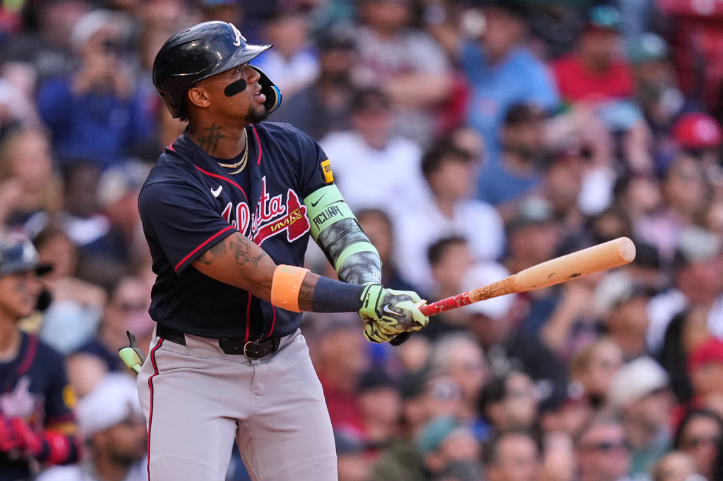 Atlanta Braves' Ronald Acuña Jr. watches the ball on his grand slam during the sixth inning of a baseball game against the Boston Red Sox, Thursday, May 28, 2026, in Boston. (AP Photo/Charles Krupa)