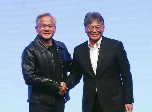 Nvidia Chief Executive Jensen Huang, left, and Fujitsu Chief Executive Takahito Tokita shake hands during an announcement in Tokyo Friday, Oct. 3, 2025. (Kyodo News via AP) Nvidia Chief Executive Jensen Huang, left, and Fujitsu Chief Executive Takahito Tokita shake hands during an announcement in Tokyo Friday, Oct. 3, 2025. (Kyodo News via AP)