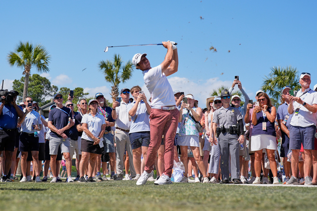 Viktor Hovland, of Norway, hits from the waste area on the 10th hole during the second round at the RBC Heritage golf tournament Friday, April 17, 2026, in Hilton Head, S.C. (AP Photo/Mike Stewart)