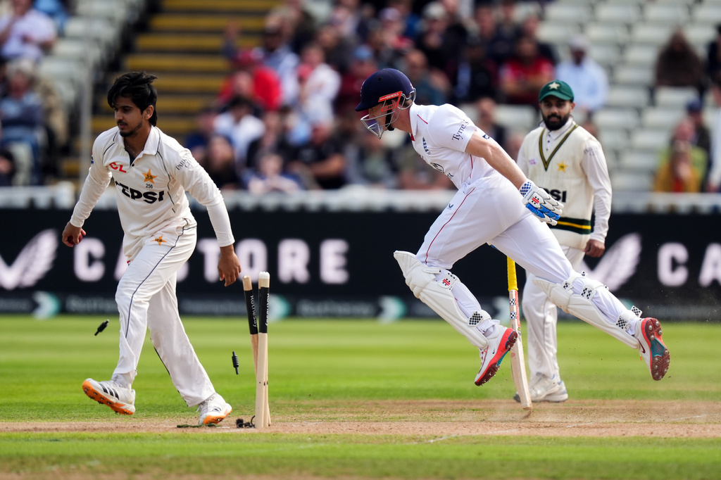 England's Harry Brook, center, is run out by Pakistan's Shan Masood during day two of the third cricket Test between England and Pakistan in Birmingham, England, Thursday Sept. 10, 2026. (Mike Egerton/PA via AP)