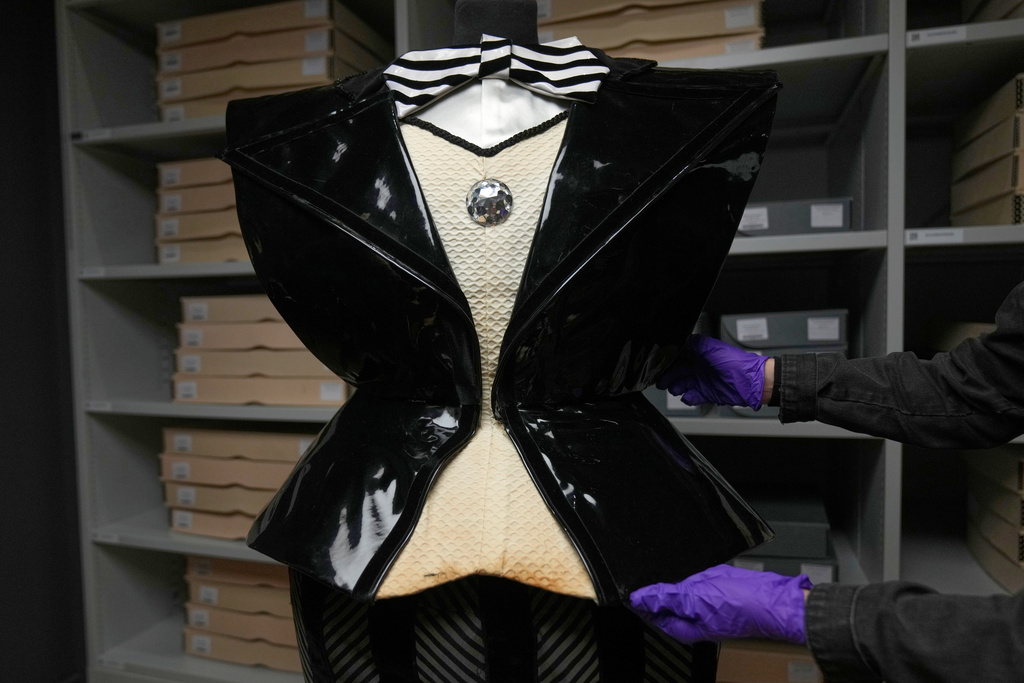 Man Who Sold the World, a wide sculpted bodice designed by David Bowie and Mark Ravitz in 1979, is on display during a press preview at the David Bowie Centre, a new archive at the V&A East Storehouse in London, Wednesday, Sept. 10, 2025, ahead of its public opening on Saturday. (AP Photo/Joanna Chan)