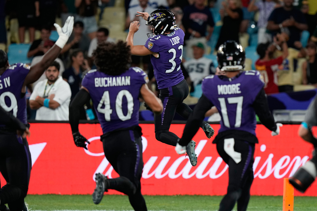 Baltimore Ravens place kicker Tyler Loop (33) celebrates after a game-winning field goal during the second half of an NFL football game against the Dallas Cowboys in Rio de Janeiro, Sunday, Sept. 27, 2026. (AP Photo/Fernando Llano)
