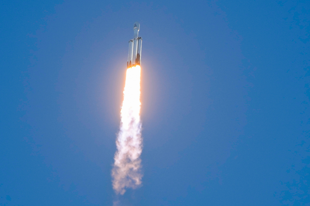 A SpaceX Falcon Heavy rocket with the space observatory Roman Telescope lifts off from launch complex 39A at the Kennedy Space Center in Cape Canaveral, Fla., Sunday, Aug. 30, 2026. (AP Photo/John Raoux)