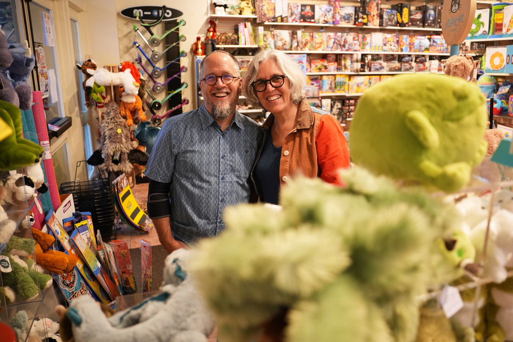 FILE - Co-owners Dean Smith, left, and Joanne Farrugia pose for a photograph in JaZams, one of their toy stores Friday, June 27, 2025, in Princeton, N.J. (AP Photo/Matt Slocum)