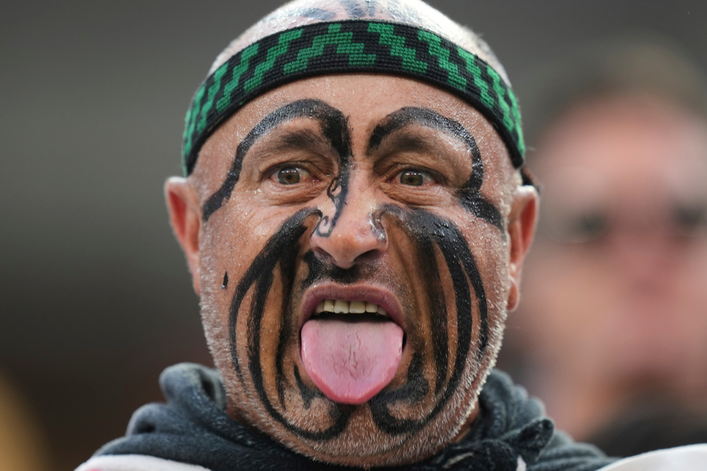 A fan of New Zealand performs a haka ahead of the World Cup Group G soccer match between Iran and New Zealand in Inglewood, Calif., near Los Angeles, Monday, June 15, 2026. (AP Photo/Andre Penner)