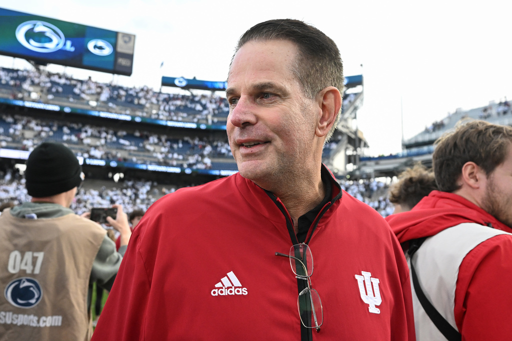Indiana head coach Curt Cignetti celebrates a win over Penn State following an NCAA college football game, Saturday, Nov. 8, 2025, in State College, Pa. (AP Photo/Barry Reeger)