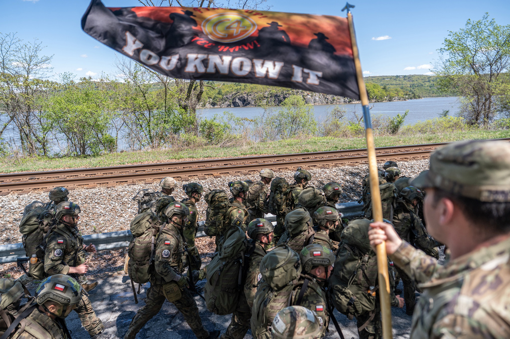 Polish cadets run to their next station during the Sandhurst Military Skills Competition at the United States Military Academy in West Point, N.Y., Friday, May 1, 2026. (AP Photo/Julia Demaree Nikhinson)