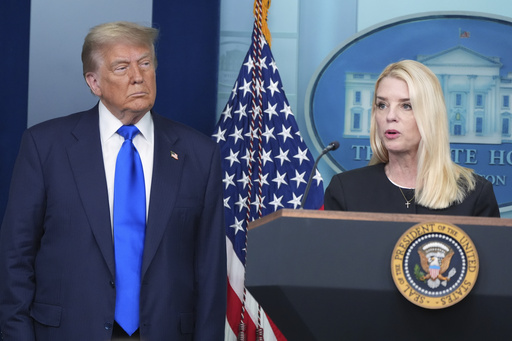 FILE - Attorney General Pam Bondi speaks to reporters as President Donald Trump listens, Friday, June 27, 2025, in the briefing room of the White House in Washington. (AP Photo/Jacquelyn Martin, File) FILE - Attorney General Pam Bondi speaks to reporters as President Donald Trump listens, Friday, June 27, 2025, in the briefing room of the White House in Washington. (AP Photo/Jacquelyn Martin, File)