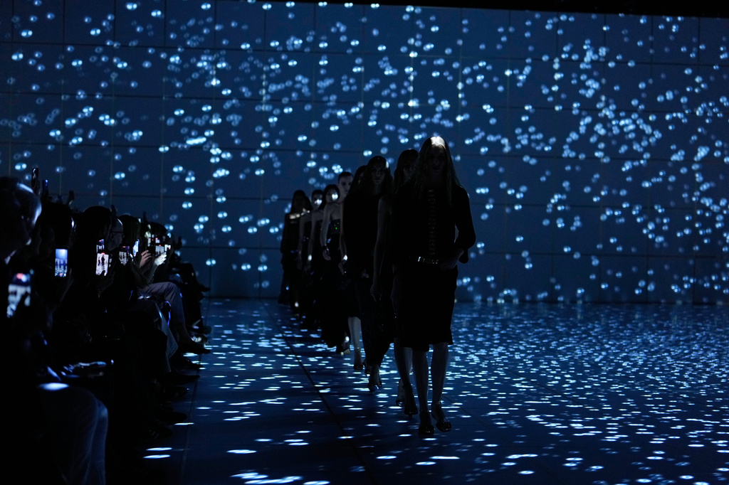 Models wear creations part of the Giorgio Armani women's Spring-Summer 2027 collection, presented in Milan, Italy, Sunday, Sept. 27, 2026. (AP Photo/Luca Bruno)