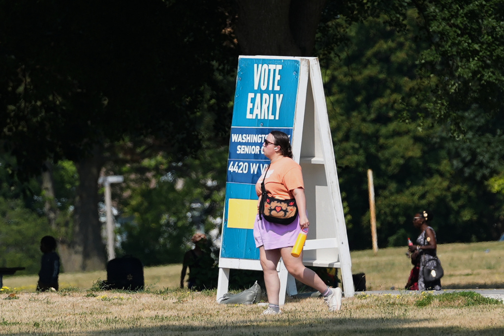 A voter arrives at a polling place in Milwaukee, Tuesday, July 28, 2026. (AP Photo/Nam Y. Huh)