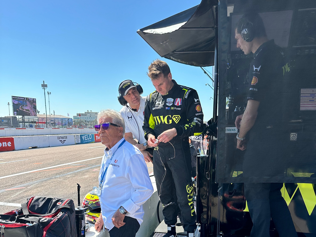 Will Power watches the IndyCar race on pit lane after hitting the wall in his debut for Andretti Global on Sunday, March 1, 2026 in St. Petersburg, Fla. (AP Photo/Jenna Fryer)