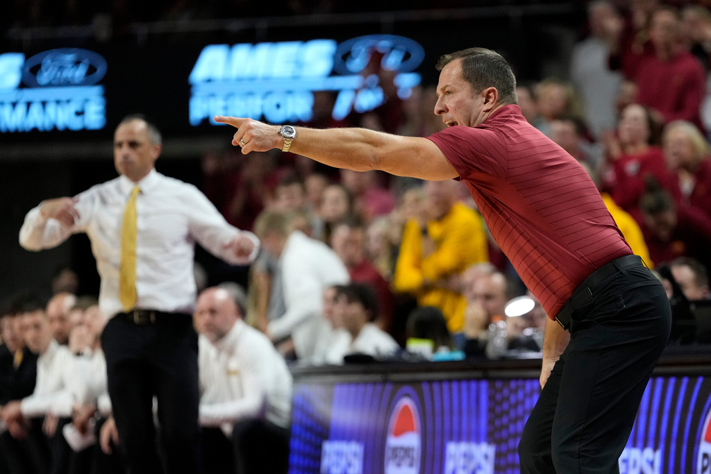 Iowa State head coach T.J. Otzelberger directs his team during the first half of an NCAA college basketball game against Iowa, Thursday, Dec. 11, 2025, in Ames, Iowa. (AP Photo/Charlie Neibergall)