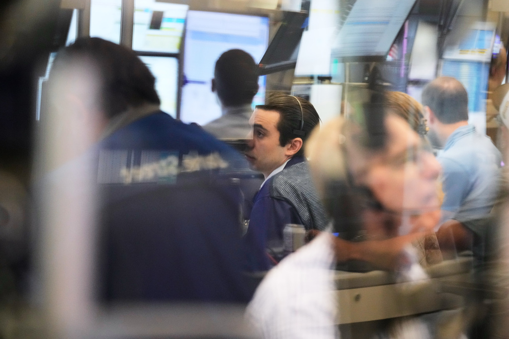Traders work on the floor at the New York Stock Exchange in New York, Monday, Sept. 14, 2026. (AP Photo/Seth Wenig)