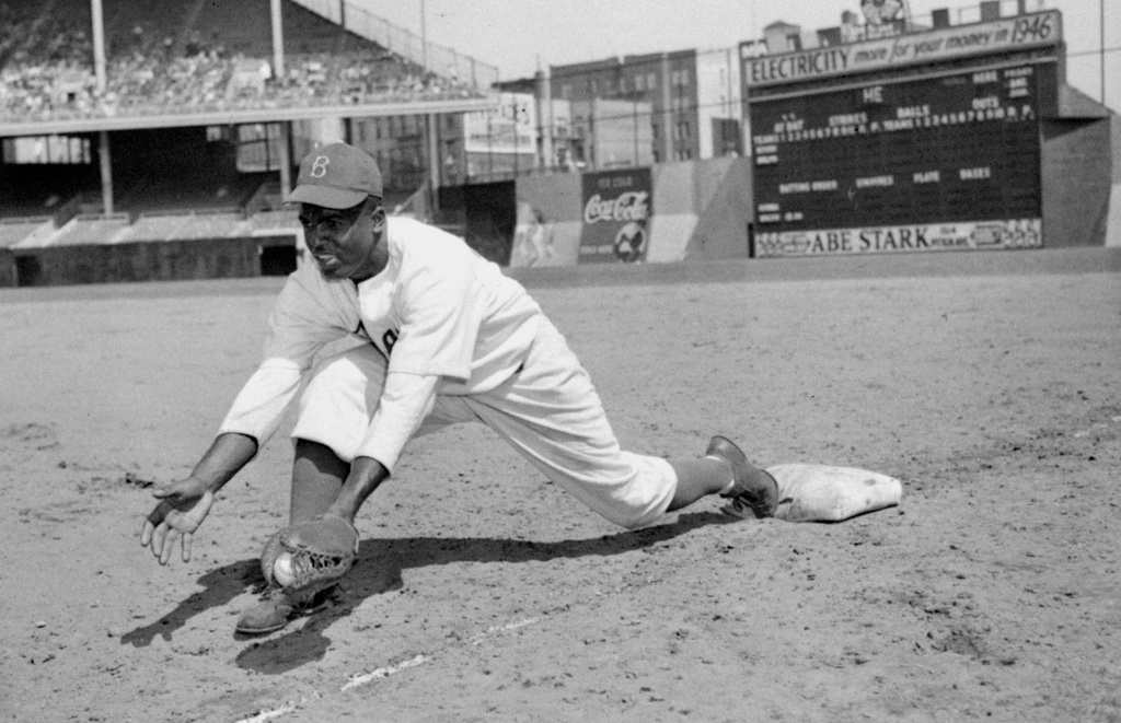 FILE - Jackie Robinson, Brooklyn Dodgers' first baseman, is shown at Ebbets Field, April 11, 1947. (AP Photo/File)