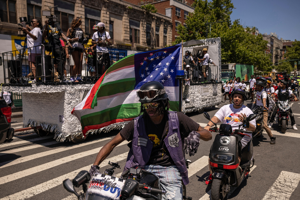 FILE - People on motorcycles participate in the 31st annual Juneteenth celebration, June 15, 2024, in the Harlem neighborhood of New York. (AP Photo/Yuki Iwamura, File)