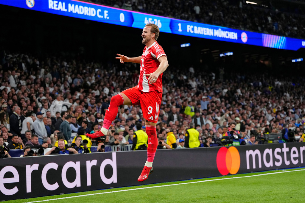 Bayern's Harry Kane celebrates scoring his side's second goal during the Champions League quarterfinal first leg soccer match between Real Madrid and Bayern Munich in Madrid, Spain, Tuesday, April 7, 2026. (AP Photo/Jose Breton)