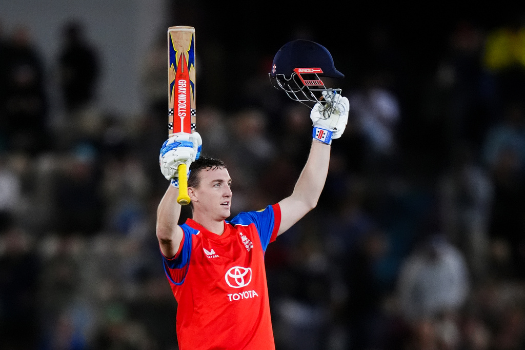 England's Harry Brook celebrates his century during the first IT20 match between England and Sri Lanka in Southampton, England, Tuesday Sept. 15, 2026. (John Walton/PA via AP)