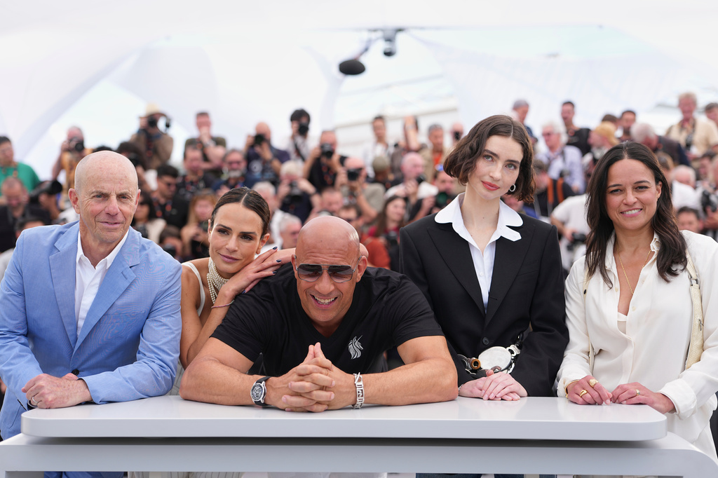 Producer Neal H. Moritz, from left, Jordana Brewster, Vin Diesel, Meadow Walker and Michelle Rodriguez pose for photographers at the photo call for the 25th anniversary of the film 'The Fast and the Furious' during the 79th international film festival, Cannes, southern France, Wednesday, May 13, 2026. (AP Photo/Andreea Alexandru)
