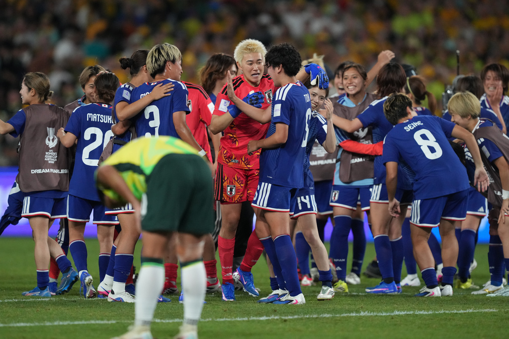Japan players celebrate during the Women's Asian Cup soccer final between Japan and Australia in Sydney, Saturday, March 21, 2026. (AP Photo/Mark Baker)