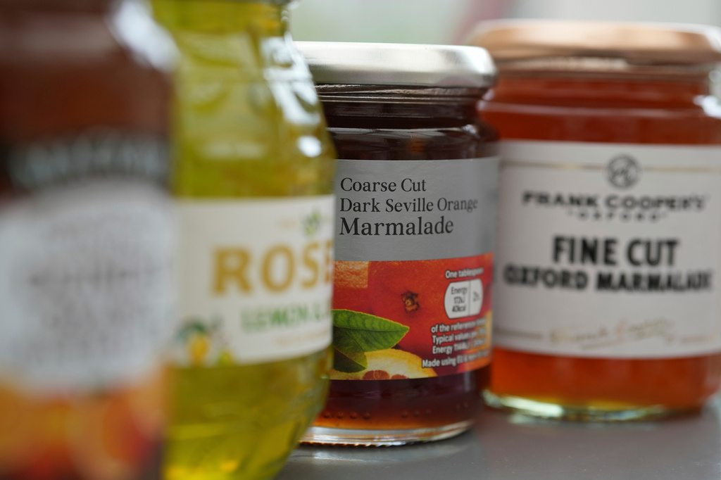 Shop bought varieties of orange marmalade are arranged for a photo in London, Wednesday, April 15, 2026. (AP Photo/Alastair Grant)
