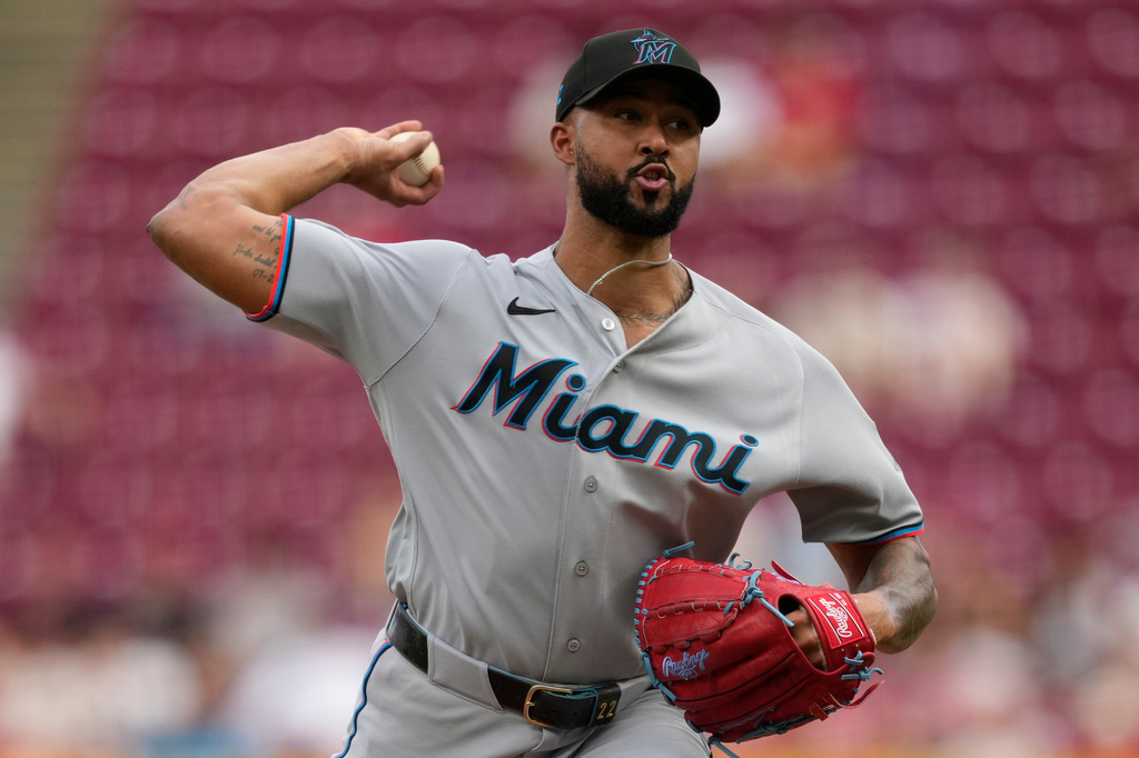 Miami Marlins pitcher Sandy Alcantara throws during the first inning of a baseball game against the Cincinnati Reds in Cincinnati, Friday, Aug. 14, 2026. (AP Photo/Carolyn Kaster)