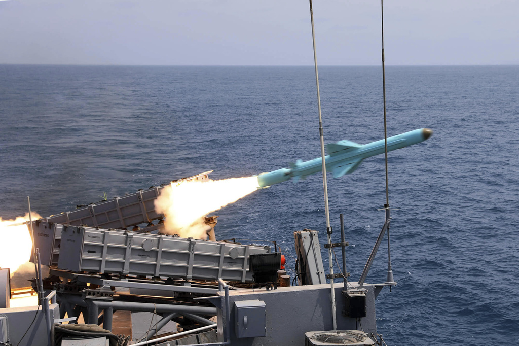 In this picture released by the official website of the Iranian Army on Thursday, Aug. 21, 2025, a missile is fired from a vessel during Iranian navy drill in the Gulf of Oman and the Indian Ocean. (Masoud Nazari Mehrabi/Iranian Army via AP)