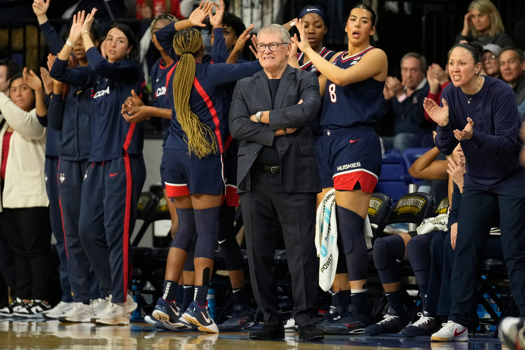 UConn head coach Geno Auriemma looks on during the first half of an NCAA college basketball game against Marquette, Saturday, Feb. 14, 2026, in Milwaukee. (AP Photo/Kayla Wolf)