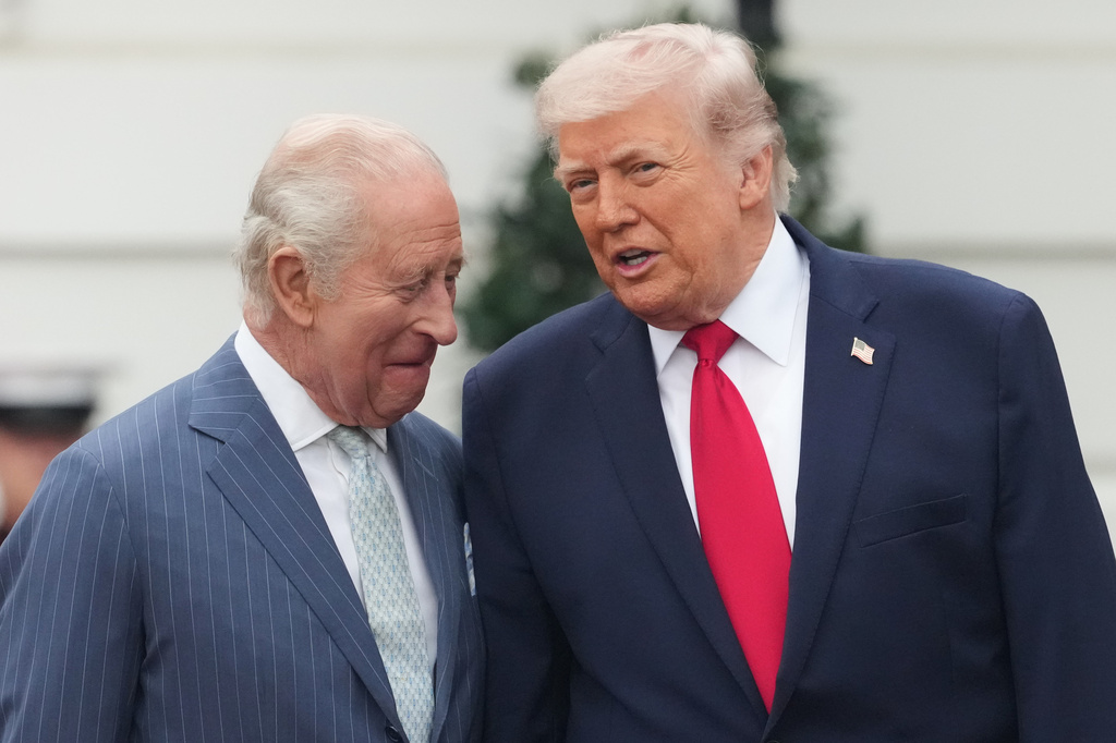 President Donald Trump and Britain's King Charles III talk on stage during a State Visit arrival ceremony on the South Lawn of the White House, Tuesday, April 28, 2026, in Washington. (AP Photo/Alex Brandon)
