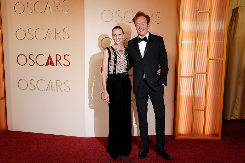 Liza Powel O'Brien, left, and Conan O'Brien arrive at the Oscars on Sunday, March 15, 2026, at the Dolby Theatre in Los Angeles. (Photo by Jordan Strauss/Invision/AP)