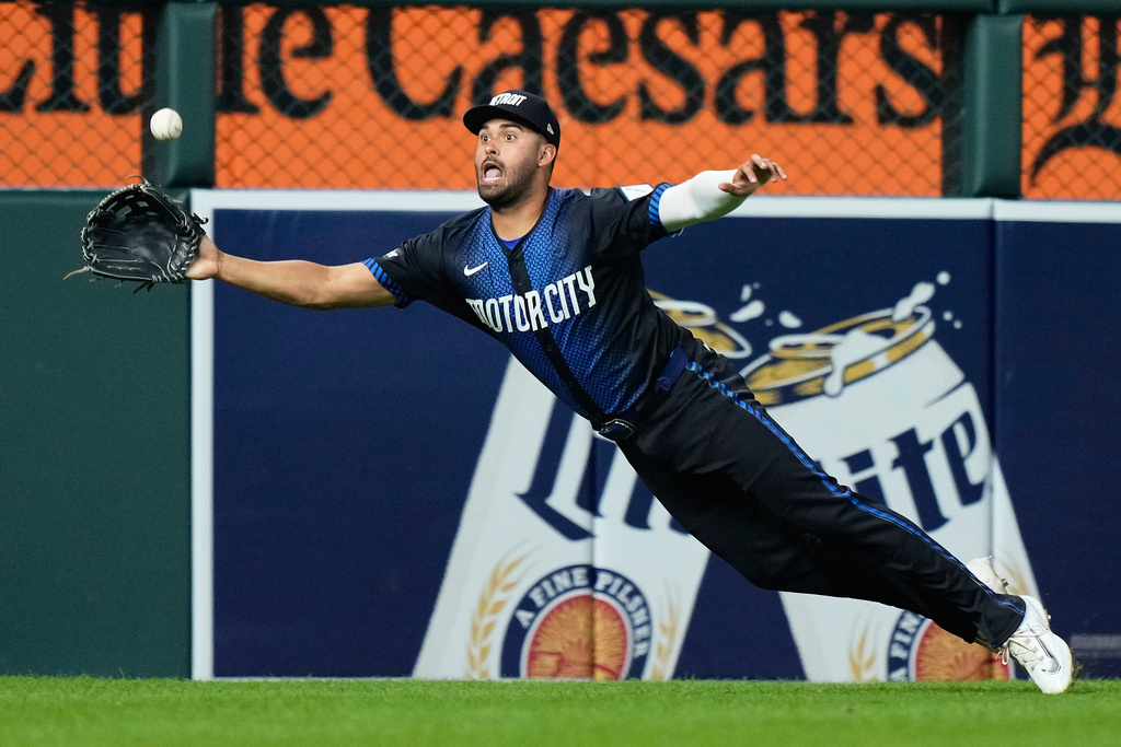 Detroit Tigers left fielder Riley Greene makes a leaping catch on a flyout hit by Los Angeles Angels' Zach Neto during the seventh inning of a baseball game Friday, Aug. 8, 2025, in Detroit. (AP Photo/Ryan Sun)