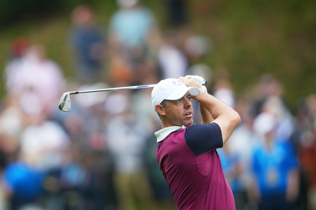 Europe's Rory McIlroy plays on the fifth hole during a practice round at the Ryder Cup golf tournament, Thursday, Sept. 25, 2025, on the Bethpage Black golf course, in Farmingdale, N.Y. (AP Photo/Lindsey Wasson)