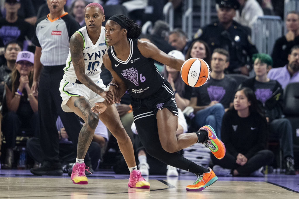Golden State Valkyries guard-forward Kaila Charles (6) drives the ball during the first quarter of her WNBA basketball game against the Minnesota Lynx in San Francisco, Saturday, Sept. 6, 2025. (Stephen Lam/San Francisco Chronicle via AP)